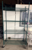 48" X 24" FOUR TIER POLY COATED SHELF ( ON CASTERS )