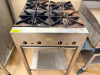 FOUR BURNER GAS RANGE W/ STAINLESS STAND. - 2