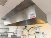 CAPTIVE AIRE 9' STAINLESS CONDENSATION HOOD SYSTEM W/ RETURN AIR AND EXHAUST FAN.