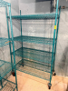 48" X 24" FOUR TIER COATED WIRE RACK. ( ON CASTERS )