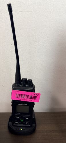 (3) SAMCOM WALKIE TALKIES W/ CHARGING BASE.