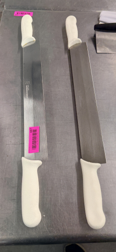 (2) STAINLESS ROCKER KNIVES.