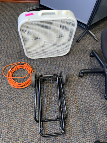 FAN, LUGGAGE CART, AND EXTENSION CORD.