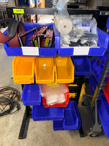 24" DOUBLE SIDED ORGANIZER SHELF W/ BINS AND CONTENTS.
