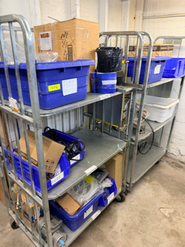 CONTENTS OF (2) CARTS - PRODUCTION LINE HARDWARE AND PARTS.