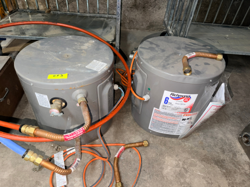 (2) ELECTRIC POINT-OF-USE WATER HEATERS WITH COMPACT TANK DESIGN.