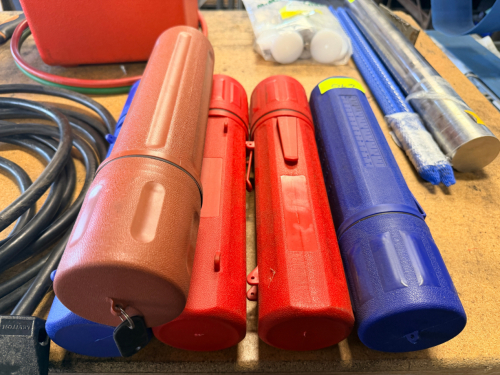 (5) EMPTY WELDING ROD CONTAINERS.
