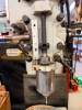ACRA VARIABLE SPEED VERTICAL MILLING MACHINE WITH SWIVEL RAM, POWER FEED TABLE, DIGITAL READOUT, AND MACHINE VISE. MACHINE FEATURES A MEEHANITE CASTING CONSTRUCTION, VARIABLE SPEED HEAD WITH RPM DISPLAY, QUILL FEED, T-SLOTTED TABLE, AND INSTALLED NEWALL T - 5