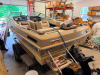1986 BARETTA MH-191-RI BOWRIDER BOAT WITH MERCURY STERN DRIVE AND LIFETIME SINGLE-AXLE TRAILER. FIBERGLASS HULL WITH WALK-THROUGH WINDSHIELD, OPEN BOW SEATING, SWIM PLATFORM, SWIM LADDER, COCKPIT SEATING, GAUGES, MARINE RADIO, AND BIMINI TOP FRAME. BOAT S - 10