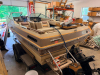 1986 BARETTA MH-191-RI BOWRIDER BOAT WITH MERCURY STERN DRIVE AND LIFETIME SINGLE-AXLE TRAILER. FIBERGLASS HULL WITH WALK-THROUGH WINDSHIELD, OPEN BOW SEATING, SWIM PLATFORM, SWIM LADDER, COCKPIT SEATING, GAUGES, MARINE RADIO, AND BIMINI TOP FRAME. BOAT S - 15