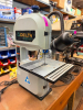 DELTA SHOPMASTER BENCHTOP BAND SAW. COMPACT WOODWORKING BAND SAW WITH CAST TABLE, INTEGRATED WORK LIGHT, AND TABLE-TILT CAPABILITY.