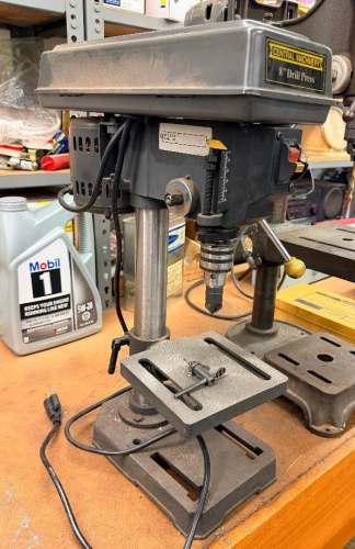 CENTRAL MACHINERY 8-INCH BENCHTOP DRILL PRESS WITH ADJUSTABLE TABLE, KEYED CHUCK, AND FIVE-SPINDLE-SPEED OPERATION. COMPACT ELECTRIC DRILL PRESS