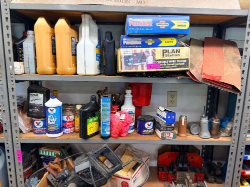 CONTENTS OF SINGLE 36" SHELF - ASSORTED OILS, HARDWARE, AND PARTS.