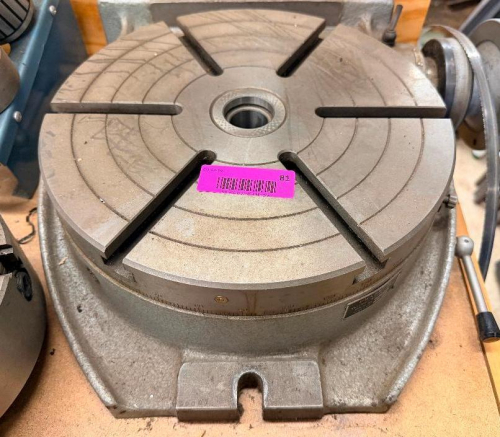 PHASE II VERTICAL/HORIZONTAL ROTARY TABLE, MODEL/STOCK NO. 221-812. PRECISION MACHINING ACCESSORY USED ON MILLING MACHINES FOR CIRCULAR CUTTING, INDEXING, ARC MACHINING, GEAR WORK, AND ACCURATE ANGULAR POSITIONING.