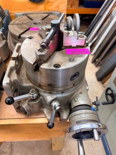 UNIVERSAL DIVIDING HEAD WITH MOUNTED 3-JAW CHUCK. DATA PLATE IDENTIFIES MODEL F3 WITH 150MM CENTER HEIGHT. UNIT APPEARS COMPLETE AS SHOWN WITH HANDWHEEL, INDEXING SCALE, AND CHUCK INSTALLED. SERIAL NO. AD07039.