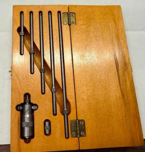 STARRETT MICROMETER DEPTH GAGE SET WITH INTERCHANGEABLE EXTENSION RODS AND FITTED WOODEN STORAGE CASE.