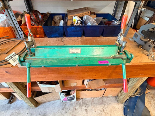 24-INCH BENCH-MOUNT SHEET METAL BENDING BRAKE.