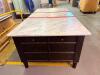 LARGE RECTANGULAR KITCHEN ISLAND/WORKTABLE FEATURING A POLISHED MARBLE TOP, DARK WOOD BASE CONSTRUCTION, MULTIPLE STORAGE DRAWERS ON ALL SIDES, AND A CENTER CABINET WITH PULL-OUT SHELF. FINISHED WITH DECORATIVE HARDWARE AND TAPERED LEGS. - 7