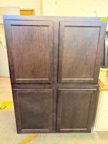 DARK ESPRESSO FINISH KITCHEN CABINET SET CONSISTING OF MULTIPLE WALL AND BASE CABINET SECTIONS WITH RAISED PANEL DOORS, ADJUSTABLE INTERIOR SHELVING, AND MATCHING DRAWER COMPONENTS. LOT INCLUDES ASSORTED CABINET BOXES, DOORS, AND DRAWER UNITS AS SHOWN.