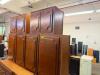 TRADITIONAL KITCHEN CABINET SET CONSISTING OF MULTIPLE WALL CABINETS, BASE CABINETS, DRAWER BASE UNITS, AND STORAGE CABINET SECTIONS. FEATURES DECORATIVE RAISED PANEL DOORS WITH ROUTED EDGE DETAILS AND A MEDIUM CHERRY STAIN FINISH. - 2