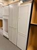 WHITE SHAKER-STYLE TALL PANTRY CABINET SET CONSISTING OF ONE DOUBLE-DOOR FULL-HEIGHT CABINET AND ONE SINGLE-DOOR FULL-HEIGHT CABINET. CABINETS FEATURE RECESSED PANEL DOORS WITH A PAINTED WHITE FINISH - 2