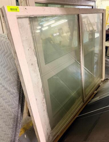 46" X44" WOOD DOUBLE-HUNG WINDOW WITH INSULATED GLASS, PAINTED WHITE EXTERIOR FINISH, AND TRADITIONAL WOOD FRAME CONSTRUCTION.