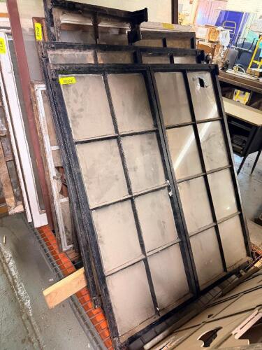 (4) 40 IN. W X 1-1/2 IN. D X 50 IN. ANTIQUE STEEL INDUSTRIAL MULTI-LITE WINDOW WITH DIVIDED LIGHT DESIGN AND ORIGINAL BLACK FINISH. WINDOW FEATURES MULTIPLE GLASS LITES WITH SEVERAL BROKEN OR MISSING PANES