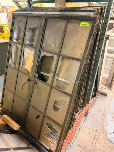 (4) 40 IN. W X 1-1/2 IN. D X 50 IN. ANTIQUE STEEL INDUSTRIAL MULTI-LITE WINDOW WITH DIVIDED LIGHT DESIGN AND ORIGINAL BLACK FINISH. WINDOW FEATURES MULTIPLE GLASS LITES WITH SEVERAL BROKEN OR MISSING PANES