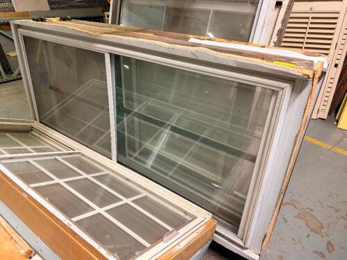 72 IN. W X 5-1/2 IN. D X 38 INWOOD-CLAD HORIZONTAL SLIDING WINDOW WITH A NATURAL WOOD EXTERIOR FRAME, WHITE INTERIOR VINYL FRAME, AND INSULATED DUAL-PANE GLASS.
