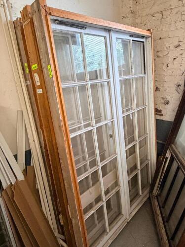 52-5/8 IN. W X 78 IN WOOD DOUBLE-HUNG WINDOW UNIT WITH SIMULATED DIVIDED LITES. PAINTED WHITE EXTERIOR WITH NATURAL WOOD JAMB AND PULLEY WEIGHT SYSTEM. REMOVED FROM THE PULITZER HOUSE.