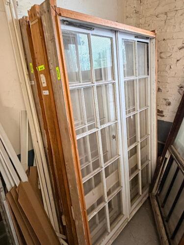 52-5/8 IN. W X 78 IN WOOD DOUBLE-HUNG WINDOW UNIT WITH SIMULATED DIVIDED LITES. PAINTED WHITE EXTERIOR WITH NATURAL WOOD JAMB AND PULLEY WEIGHT SYSTEM. REMOVED FROM THE PULITZER HOUSE.