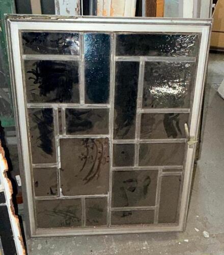 28 IN. W X 35-1/2 IN.DECORATIVE LEADED STAINED GLASS WINDOW PANEL WITH TEXTURED GLASS. METAL FRAME.
