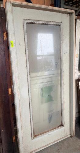 VINTAGE WOOD ENTRY DOOR WITH SINGLE LARGE GLASS LITE.