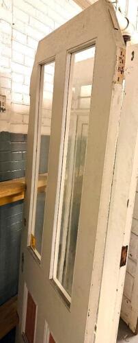 VINTAGE RECLAIMED HARDWOOD DOOR W/ GLASS INSERT PANELS.