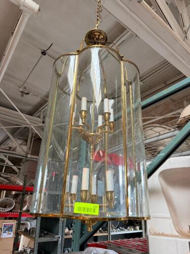 LARGE BRASS 12-LIGHT CYLINDRICAL GLASS LANTERN CHANDELIER.