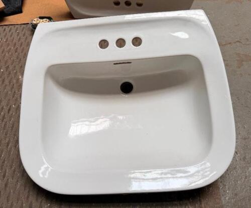 (2) PORCELAIN PEDESTAL SINKS.