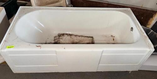 VINTAGE WHITE ENAMELED STEEL ALCOVE BATHTUB.
