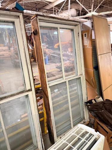 (2) VINTAGE WOOD DOUBLE-HUNG WINDOW WITH PAINTED WOOD FRAME, MULTI-PANE SASHES, AND ORIGINAL HARDWARE.