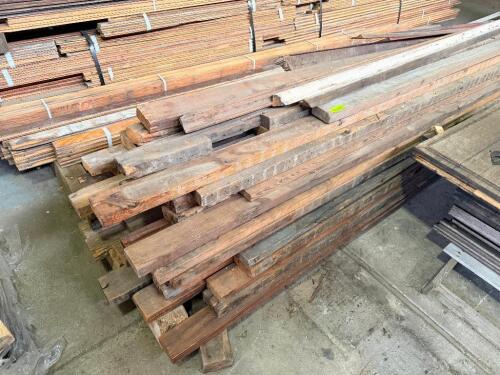 LOT OF RECLAIMED HEAVY TIMBERS AND STRUCTURAL LUMBER. LOT INCLUDES ASSORTED SOLID WOOD BEAMS, POSTS, AND DIMENSIONAL LUMBER IN VARIOUS LENGTHS AND CROSS SECTIONS SUITABLE FOR REUSE, TIMBER FRAMING, OR DECORATIVE PROJECTS.