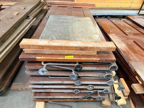(8) RECLAIMED WOOD DOORS AND DOOR COMPONENTS. LOT INCLUDES ASSORTED SOLID WOOD PANEL DOORS, GLASS DOOR INSERTS, HARDWARE, AND RELATED ARCHITECTURAL SALVAGE.