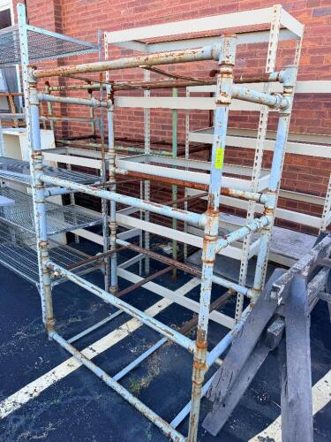48" METAL PIPE SHELVING UNIT.
