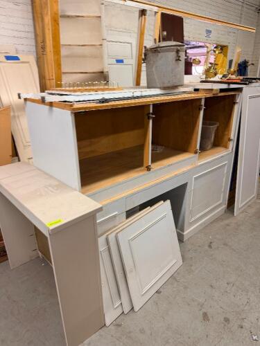 ASSORTED KITCHEN CABINETRY, CABINET DOORS, SHELVING, AND BUILT-IN STORAGE COMPONENTS. INCLUDES BASE CABINETS, UPPER CABINETS, PANTRY-STYLE PIECES, DRAWER FRONTS, AND MISCELLANEOUS WOODWORK