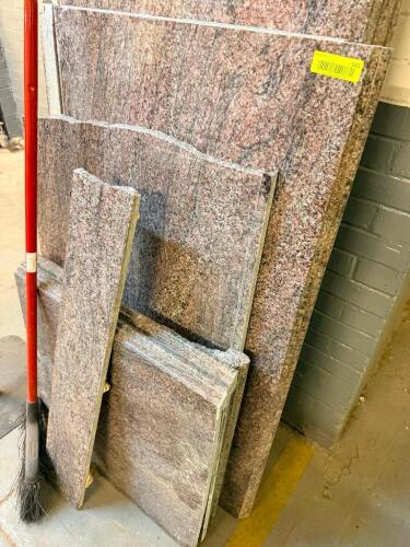 LOT OF POLISHED GRANITE STONE SLABS AND REMNANTS. INCLUDES MULTIPLE FULL-SIZE PANELS AND ASSORTED CUT PIECES SUITABLE FOR COUNTERTOPS, VANITIES, TABLETOPS, HEARTHS, AND OTHER STONE FABRICATION PROJECTS. SOLD AS ONE LOT.