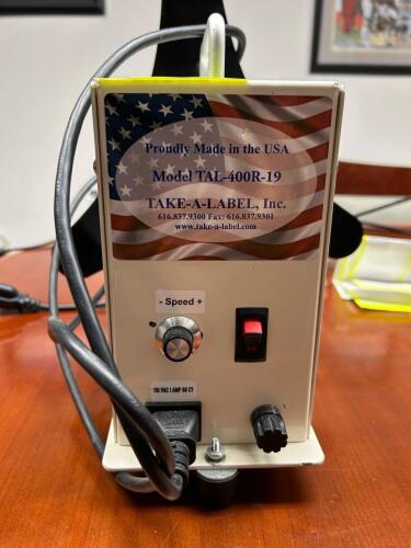 (1) LABEL REWINDER
