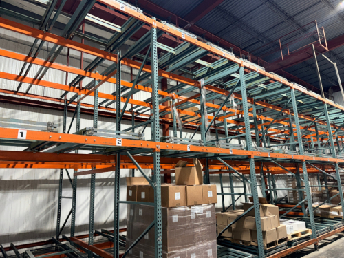 (9) SECTIONS HEAVY-DUTY TEARDROP PALLET RACK SYSTEM WITH STRUCTURAL PALLET SUPPORTS.