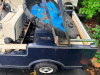 WESTERN ELECTRIC GOLF CART WITH WINDSHIELD, FOLDING CANVAS TOP, HEADLIGHTS, TWO-PERSON BENCH SEAT, REAR BAG PLATFORM, AND WHITE STEEL WHEELS. SELLER STATES BATTERY IS BAD BUT HE DOES HAVE A REPLACEMENT LITHIUM BATTERY FOR THIS CART. - 4