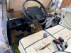 WESTERN ELECTRIC GOLF CART WITH WINDSHIELD, FOLDING CANVAS TOP, HEADLIGHTS, TWO-PERSON BENCH SEAT, REAR BAG PLATFORM, AND WHITE STEEL WHEELS. SELLER STATES BATTERY IS BAD BUT HE DOES HAVE A REPLACEMENT LITHIUM BATTERY FOR THIS CART. - 9