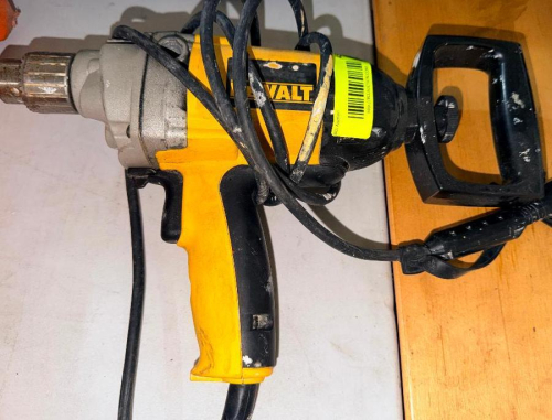 1/2" VARIABLE SPEED REVERSING DRILL WITH KEYED CHUCK AND D-HANDLE AUXILIARY HANDLE.