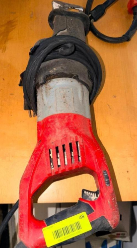RECIPROCATING SAW WITH VARIABLE SPEED TRIGGER, QUIK-LOK BLADE CLAMP, AND RUBBER OVERMOLD GRIP.