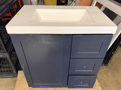 27" SOLID SURFACE RECTANGULAR VANITY TOP WITH CABINET BASE.